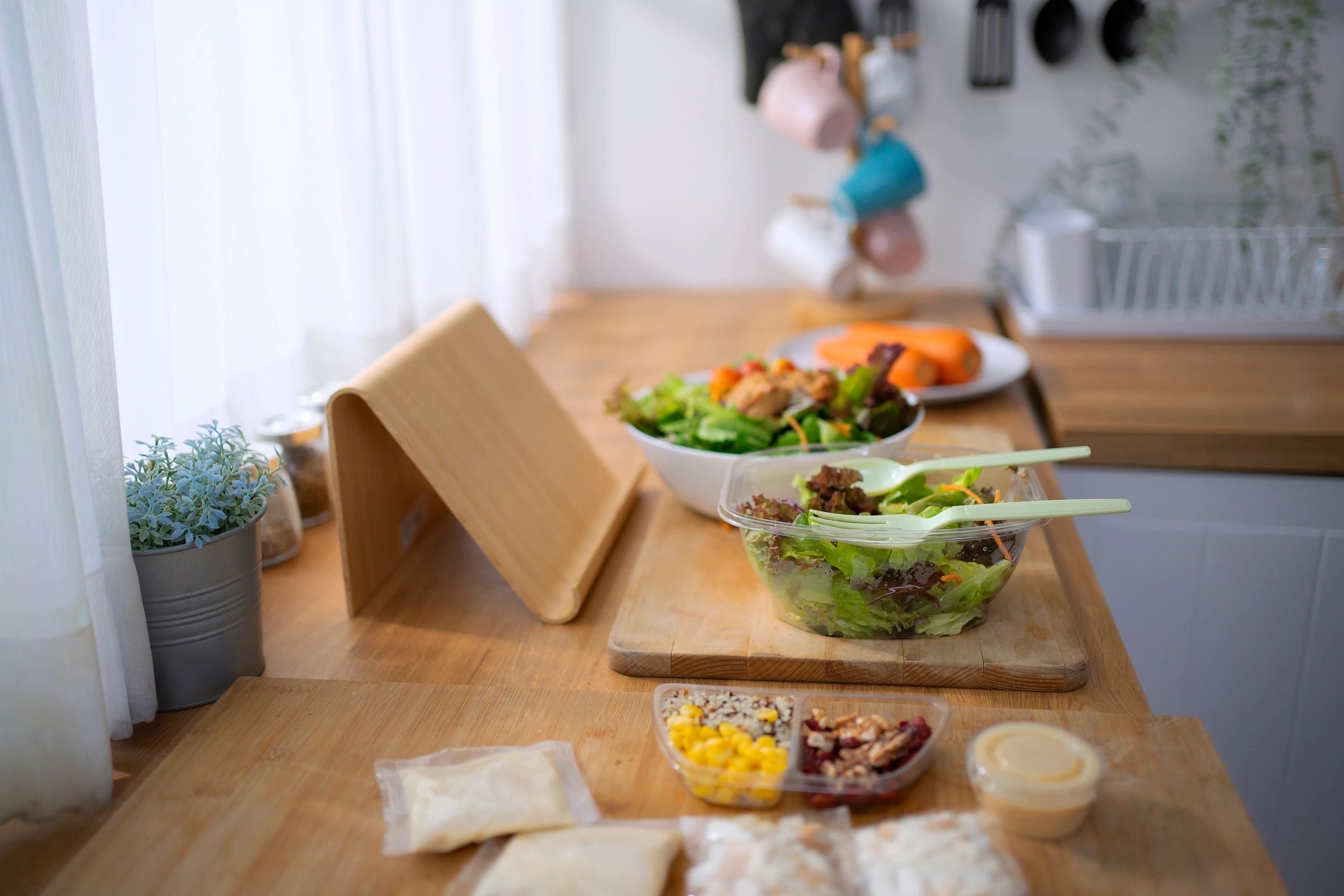 Healthy salad in a bright kitchen setting