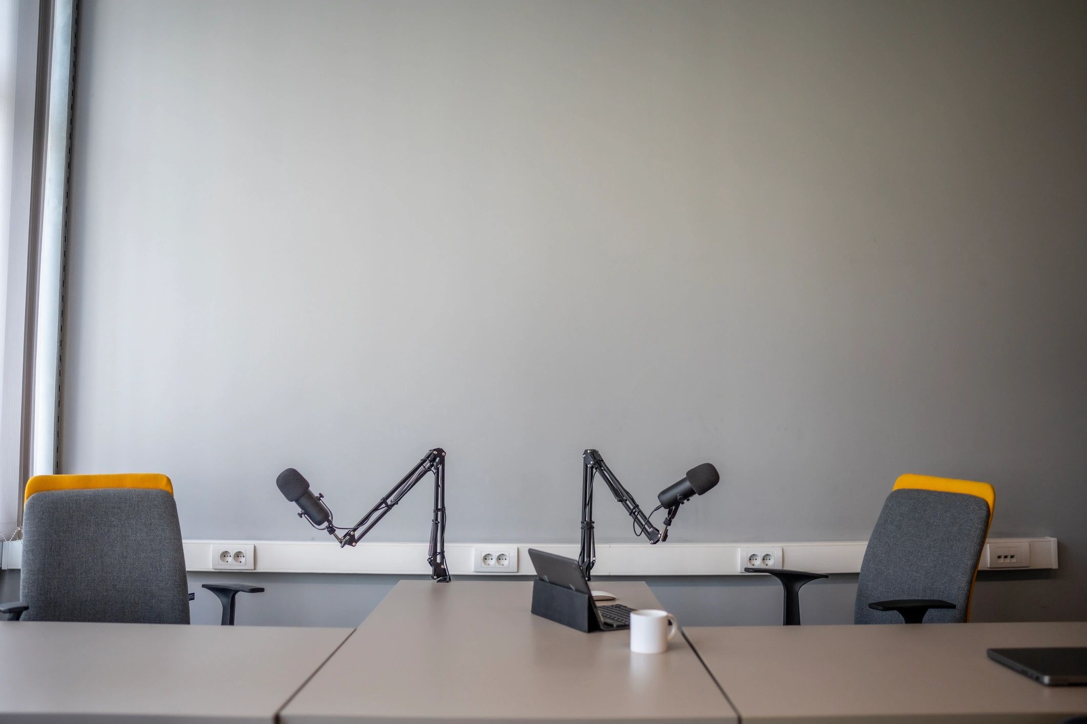Modern podcast studio setup with microphones